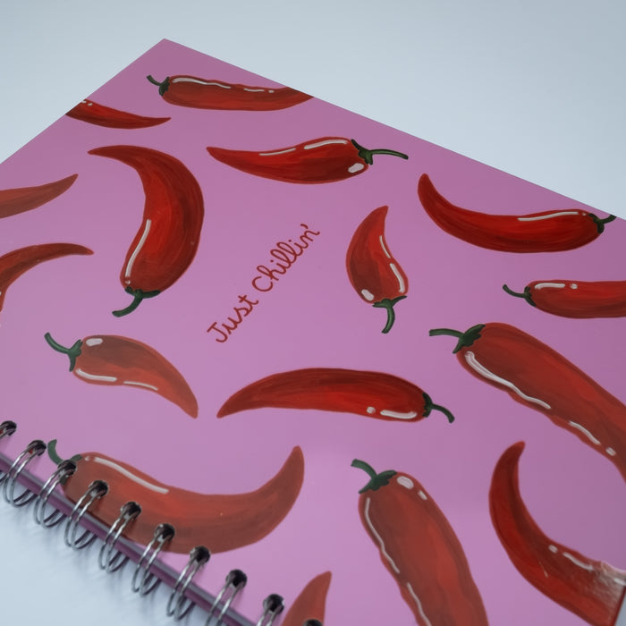Cuaderno Chiles SOS Original 2026 - Vista lateral argolla metálica